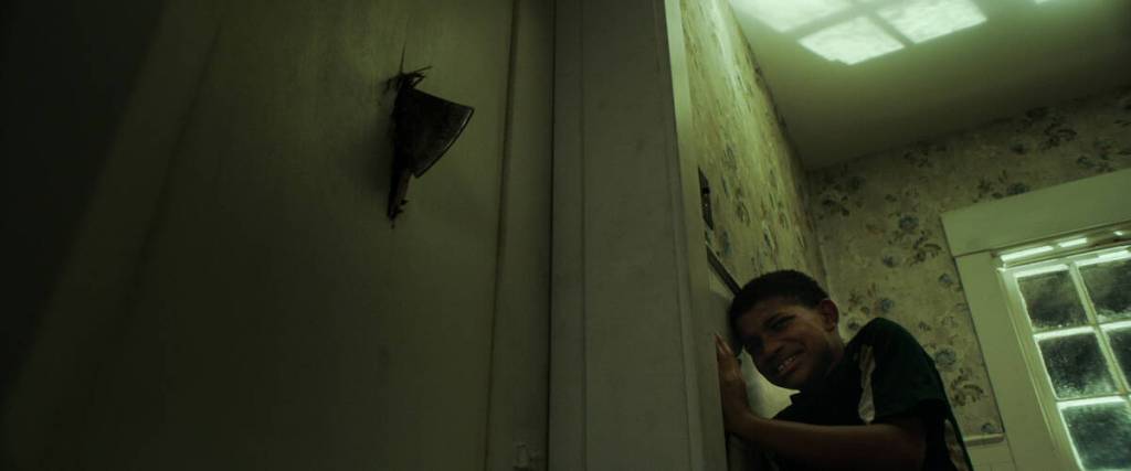 The boy behind the door